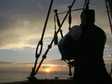 The Phantom Piper performs at sunset from the Kincardine Lighthouse.