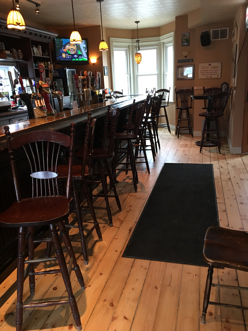 King's Pearl Bar with bar stools