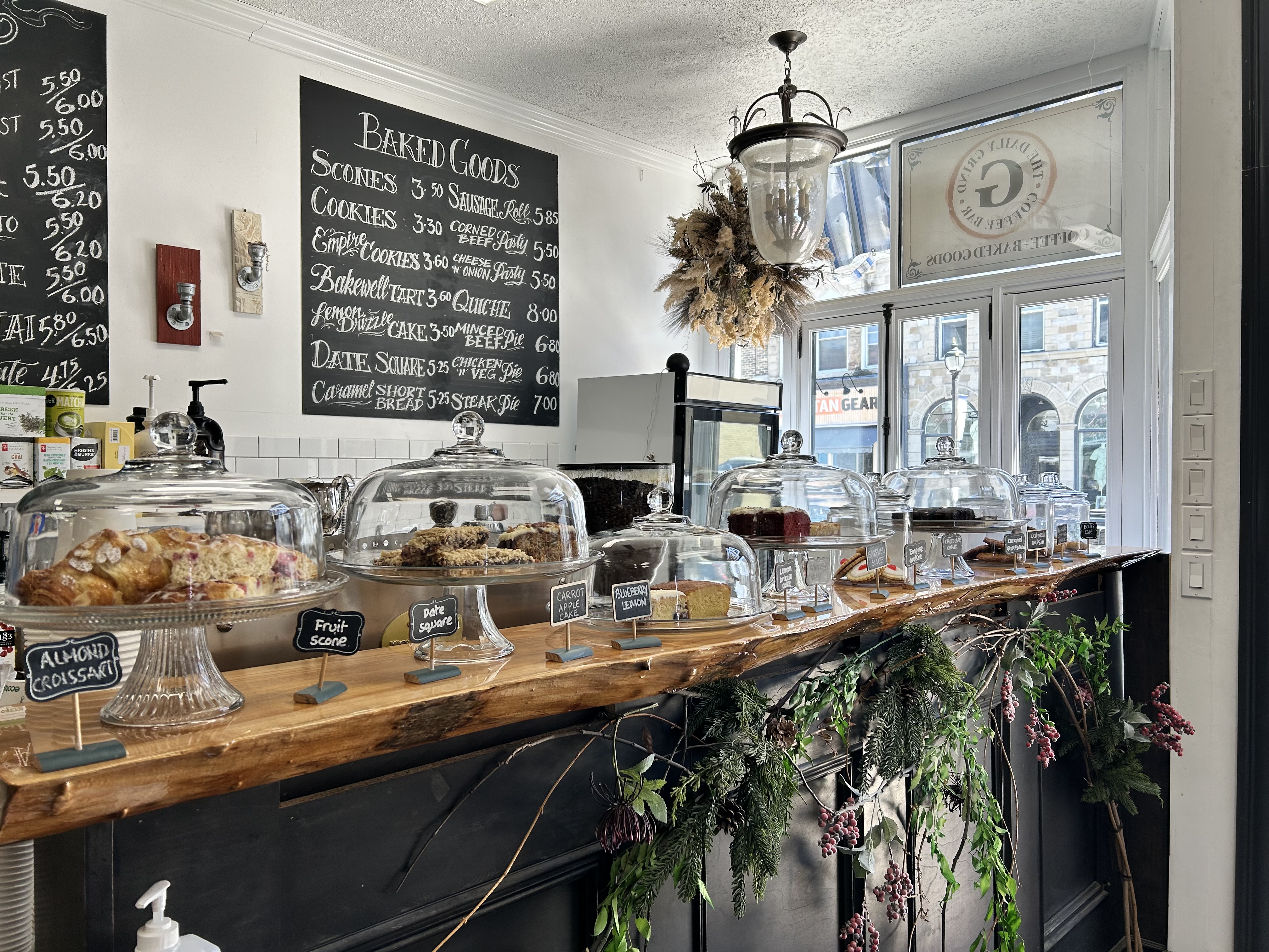 coffee shop counter with desserts on display